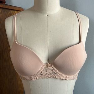 Beige lace trimmed bra